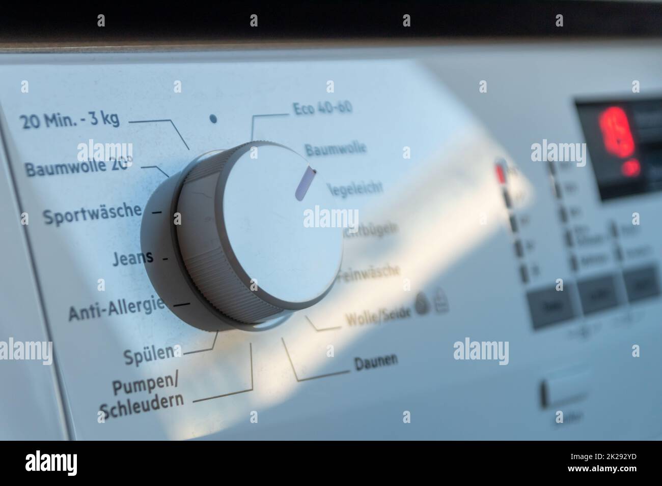 Detail view of washing machine control panel with contemporary ...
