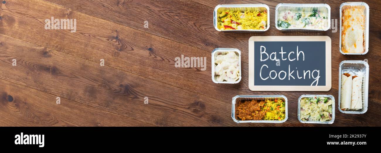 Meal Batch Cooking. Cook Dinner In Kitchen Overhead View Stock Photo