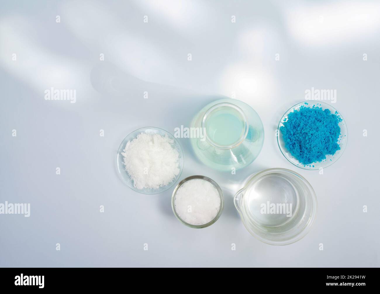 Potassium chloride and Copper(II) sulfate in chemical watch glass place