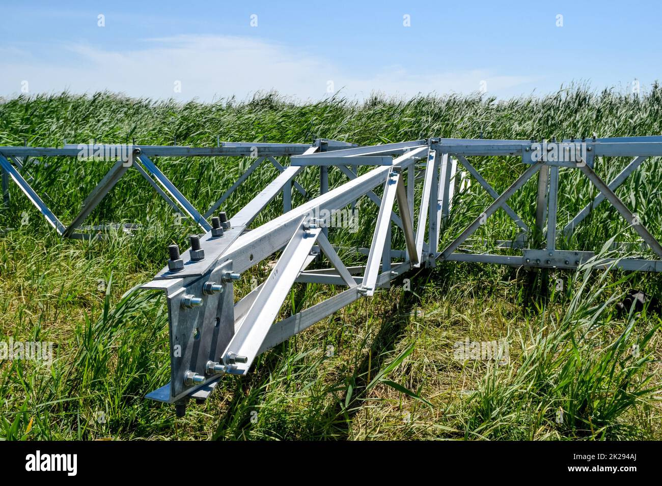 Assembly and installation of new support of a power line Stock Photo