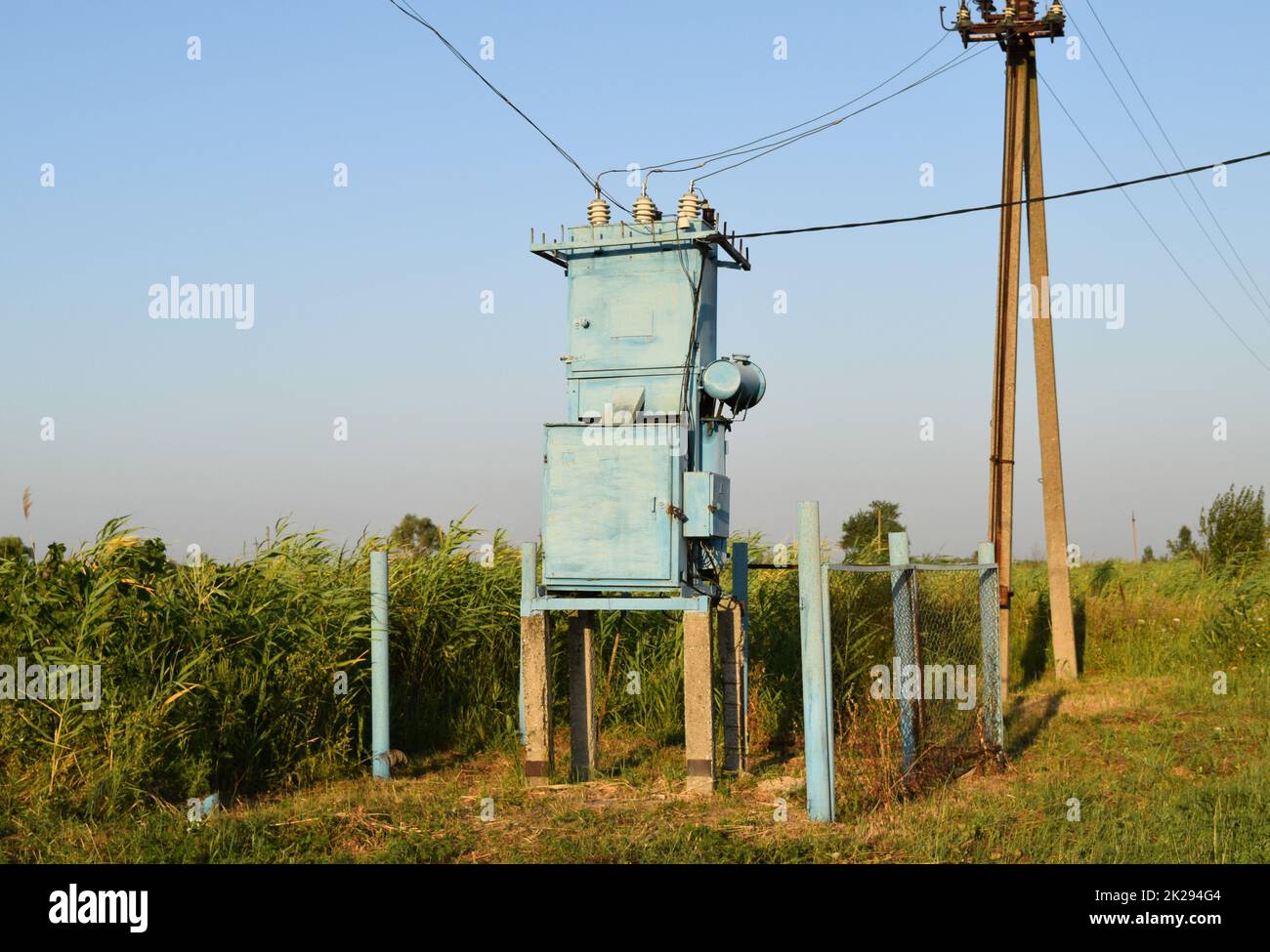 Transformers for voltage conversion. Power infrastructure. The old equipment Stock Photo