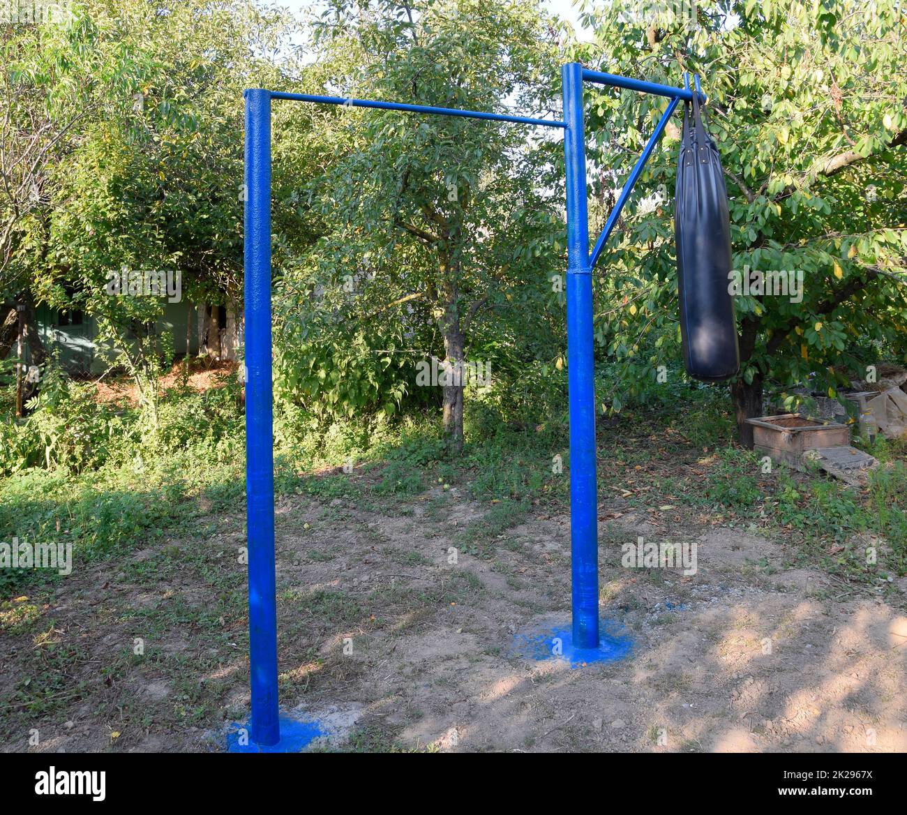 Homemade bar with a punching bag outdoors in the garden Stock Photo Alamy