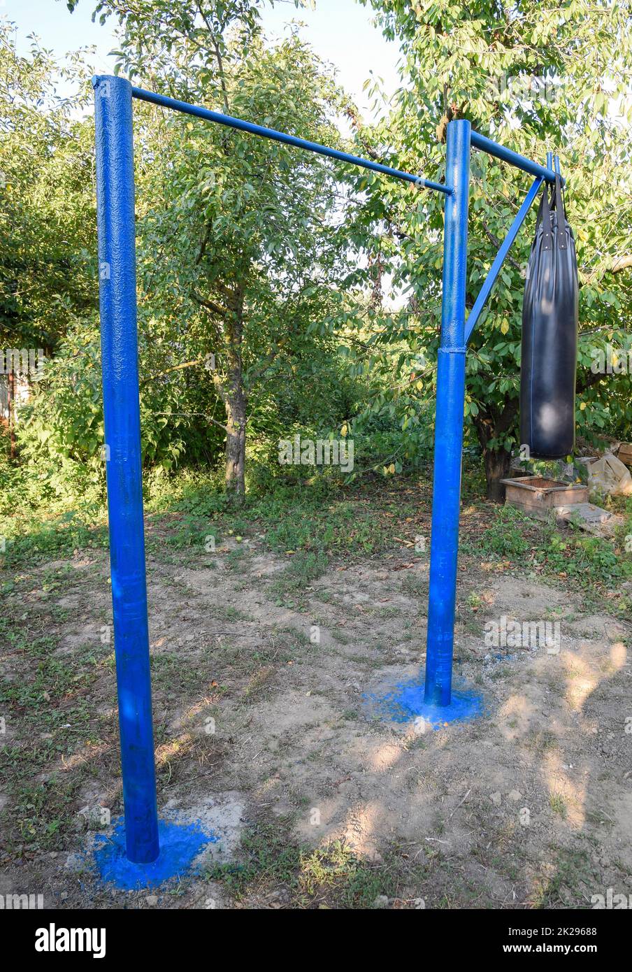 Homemade bar with a punching bag outdoors in the garden Stock Photo Alamy