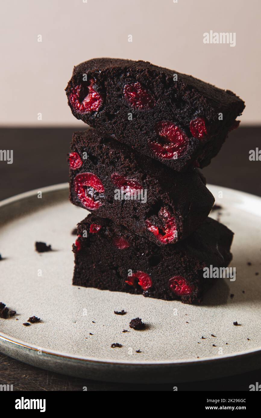 brownie with cherry. A stack of chocolate brownies, homemade bakery and