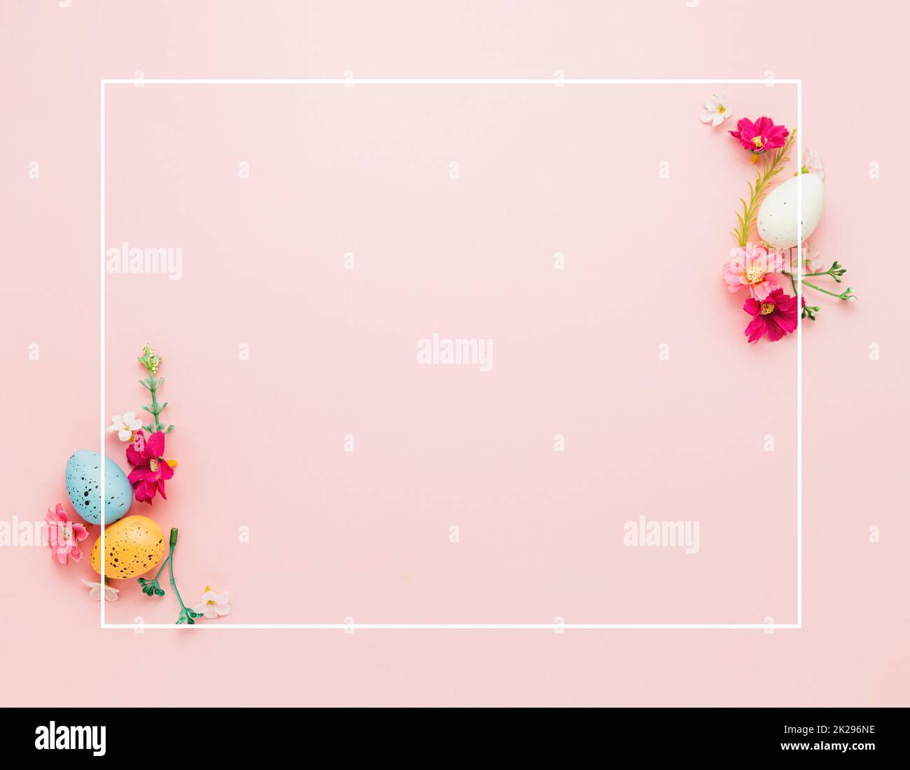 Easter holiday mockup background. Top view from above to Easter eggs with frame Stock Photo