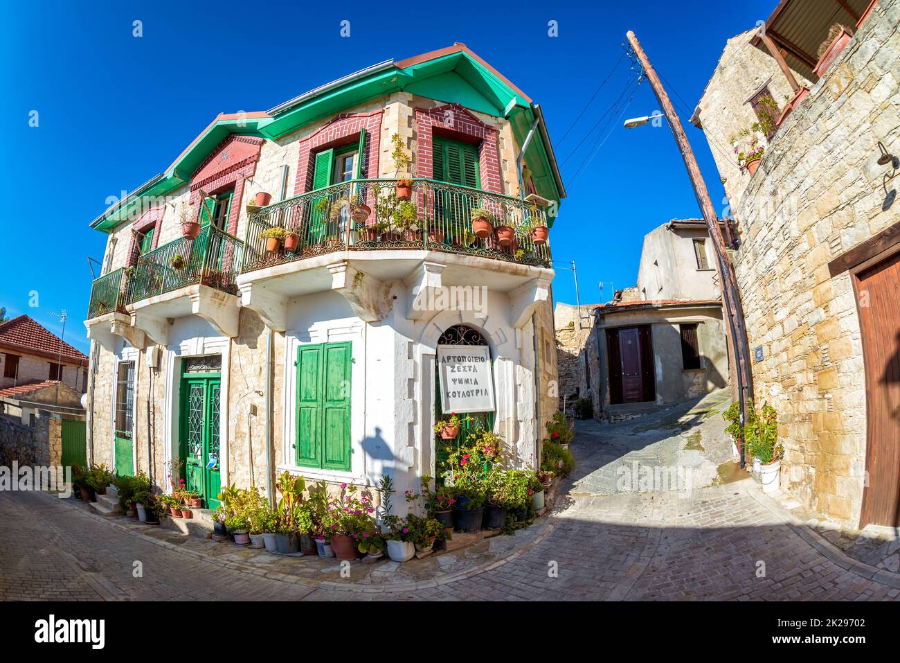 Authentic colorful mediterranean street in the village of Arsos. Limassol District, Cyprus Stock Photo
