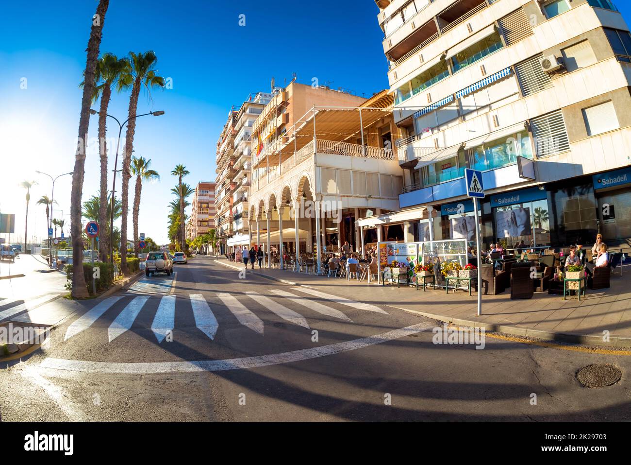 TORREVIEJA , SPAIN - NOVEMBER 13, 2017: Pedestrian crossing at Torrevieja town center on a sunny day Stock Photo