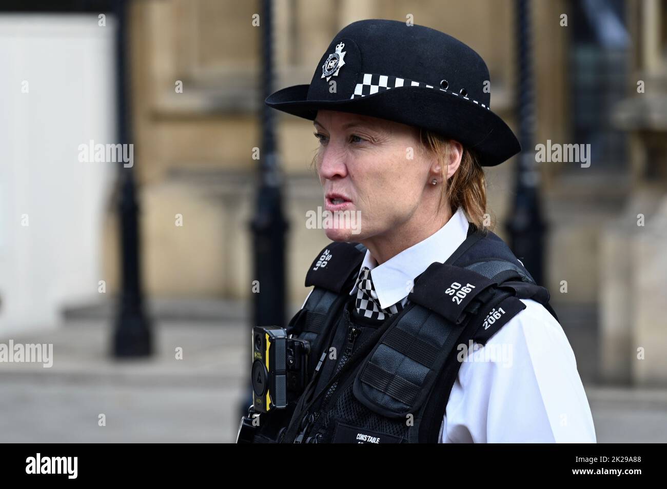 Policewoman, Houses of Parliament, Westminster, London. UK Stock Photo