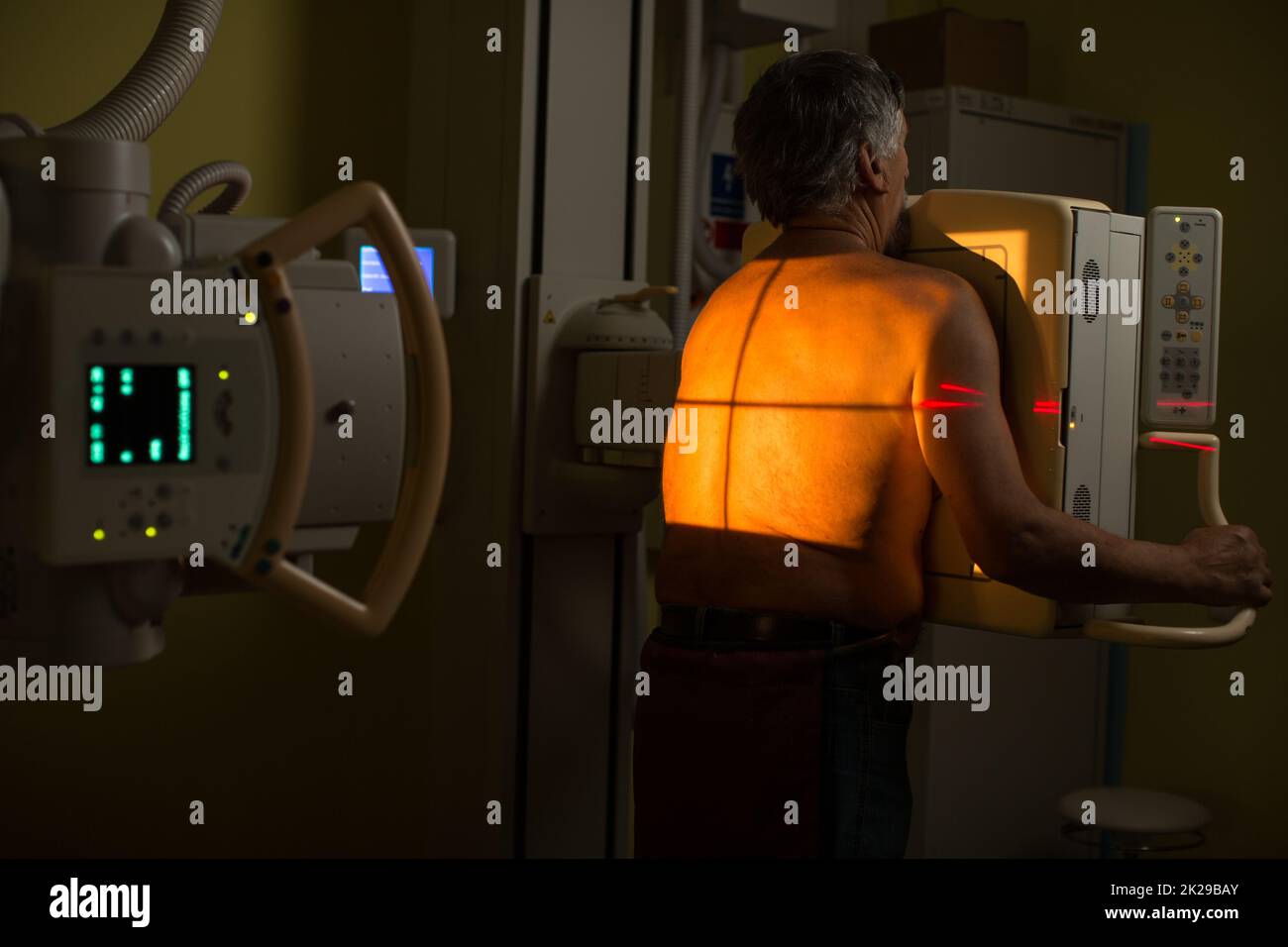 Senior man x-ray medical scan examination in a modern hospital (color toned image) Stock Photo