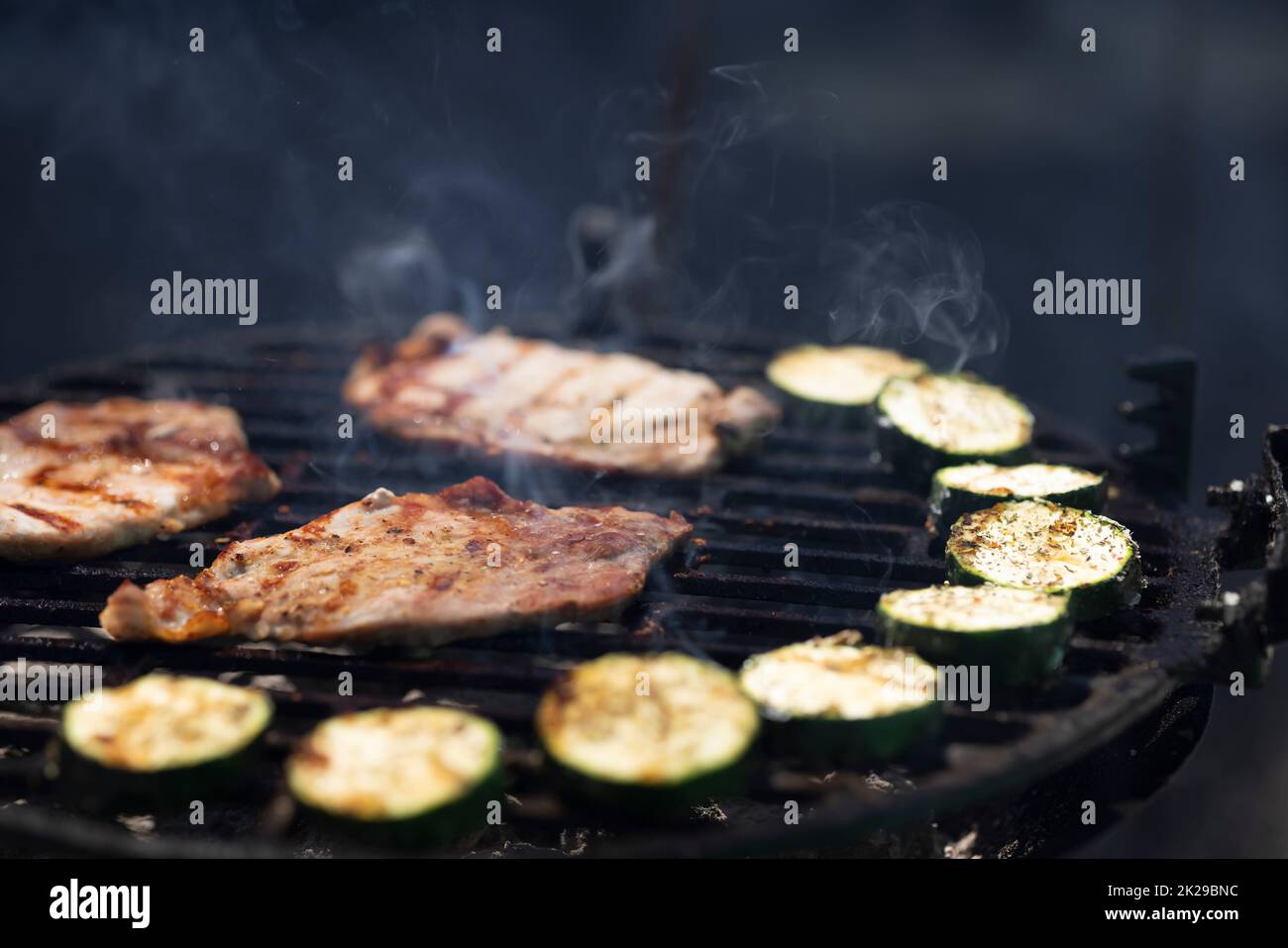 pork and zucchini, garden grill with charcoal Stock Photo Alamy