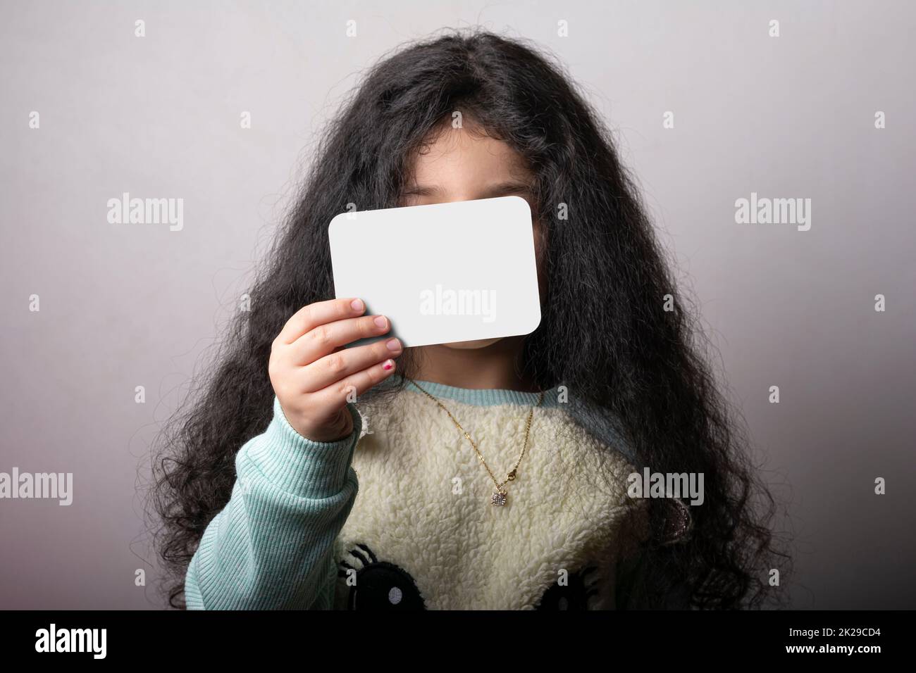 Girl covered face hair hi-res stock photography and images - Alamy