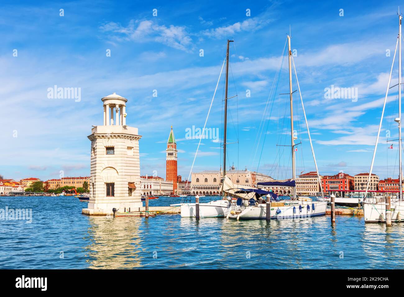 Lagoon of Venice, lighthouse and boats, beautiful italian view Stock Photo