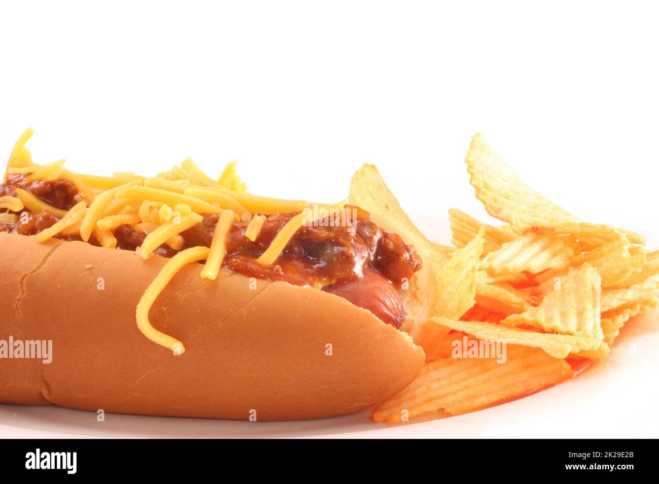 Hot Dog with Chili and Cheese with Chips Isolated on White Stock Photo