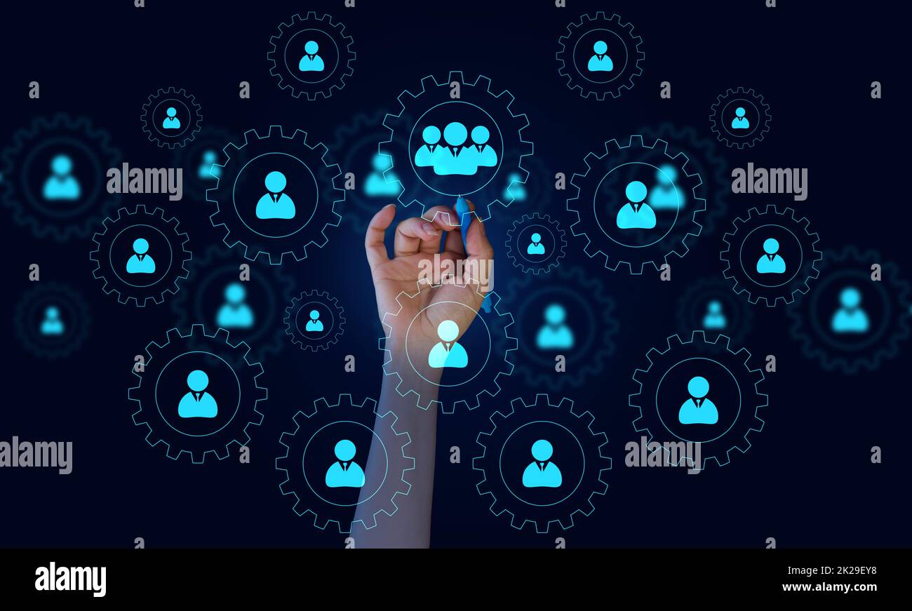 office workers icons in round gears and female hand. Concept of hierarchy in the company, corporate ethics of employees. Recruitment of personnel Stock Photo