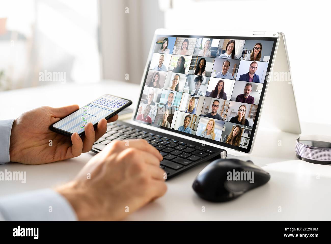 Virtual Business Presentation Or Videoconferencing On Hybrid Screen Stock Photo