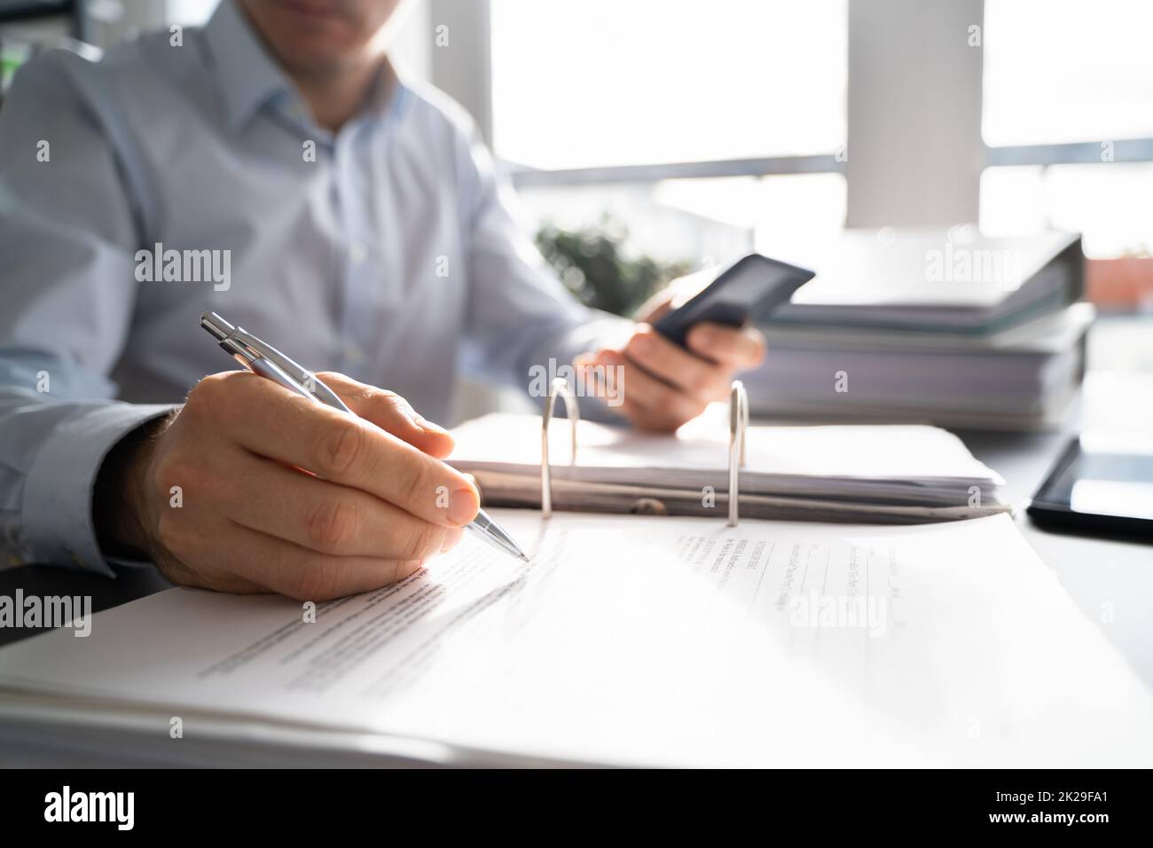 Man men male using calculator hi-res stock photography and images - Alamy