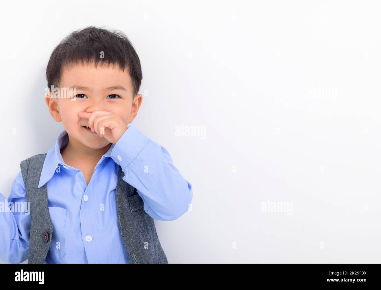 Closeup asian  Little boy face on white background Stock Photo