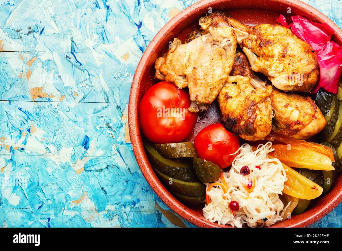 Baked chicken and pickles Stock Photo Alamy