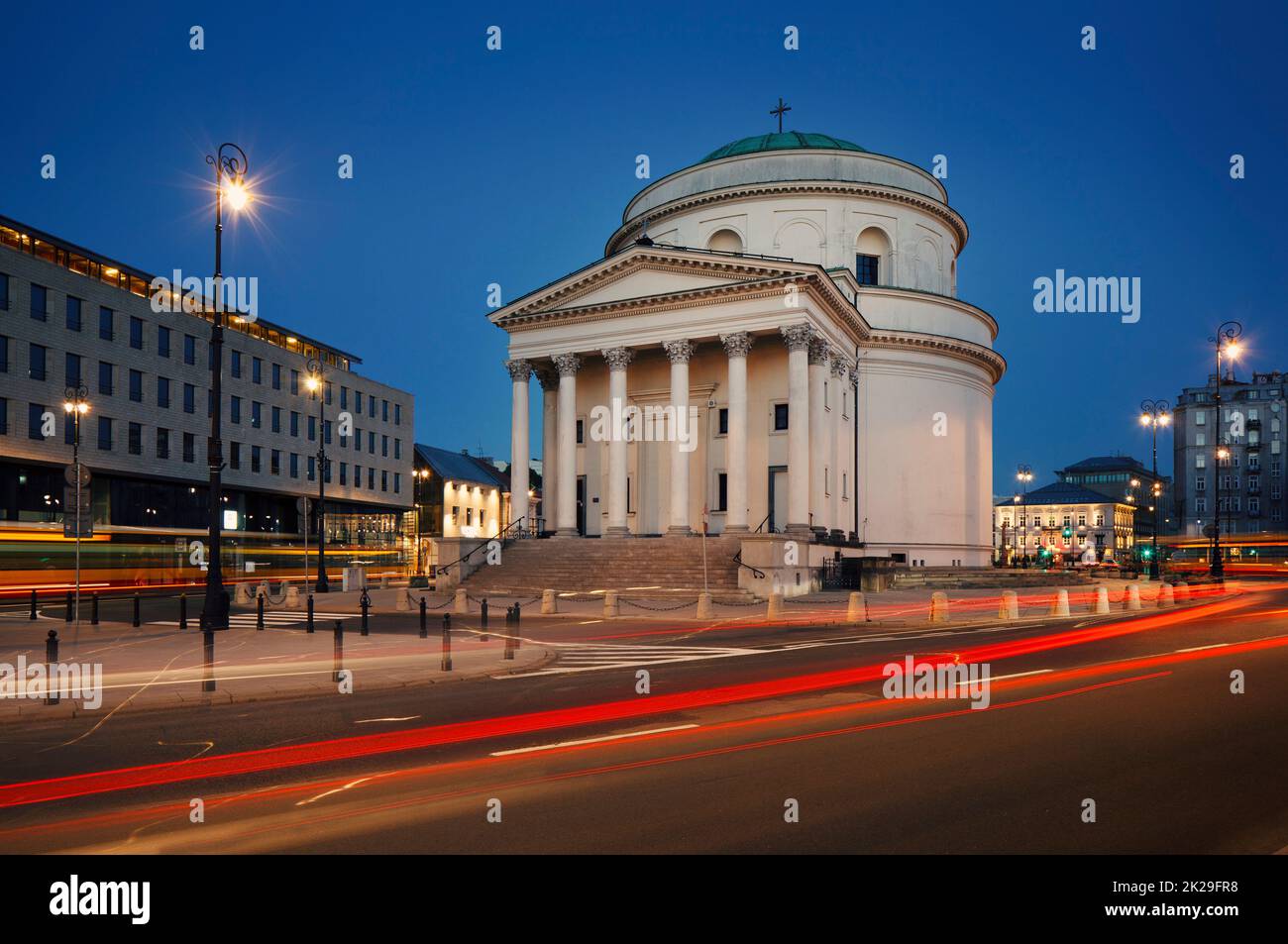 Three Crosses Square Plac Trzech KrzyÅ¼y with St. Alexander Church at night Stock Photo