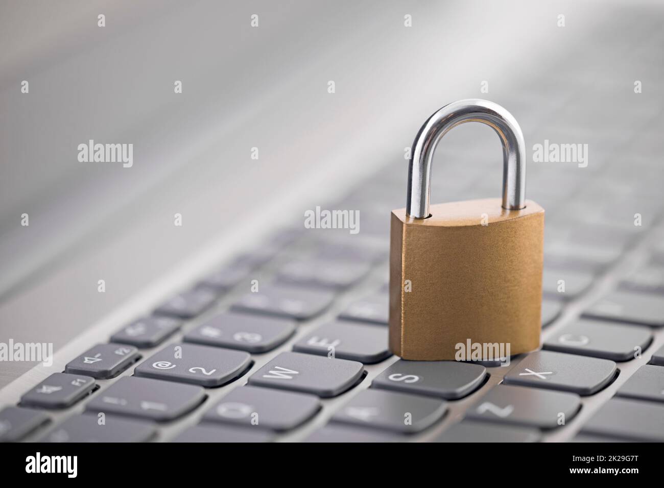 Security concept with metal padlock on computer keyboard Stock Photo