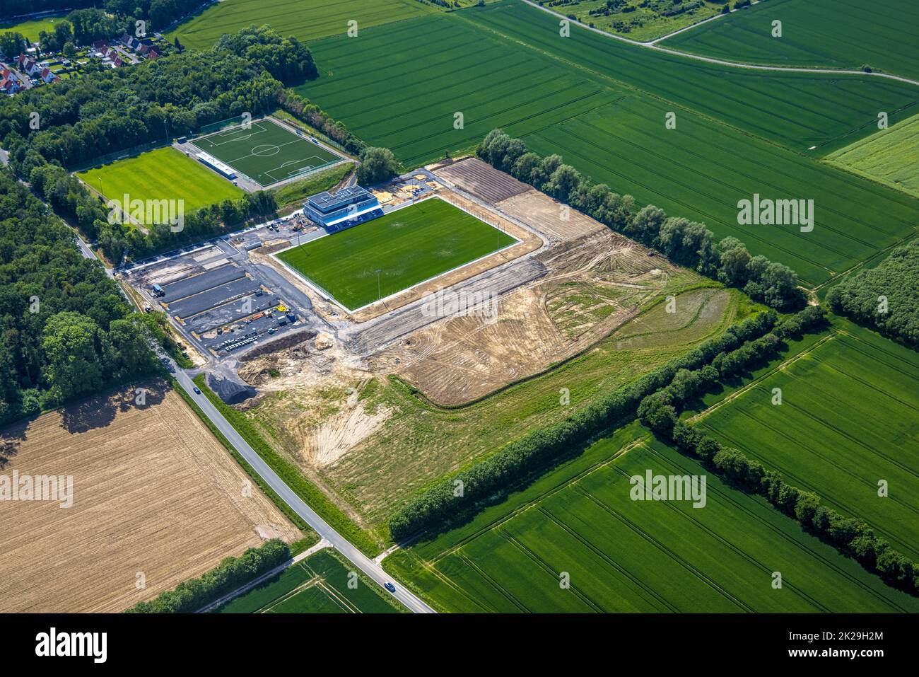 Aerial view, construction site and new building Westfalia Sportpark, sports field and club center Westfalia Rhynern with integrated sports day care ce Stock Photo
