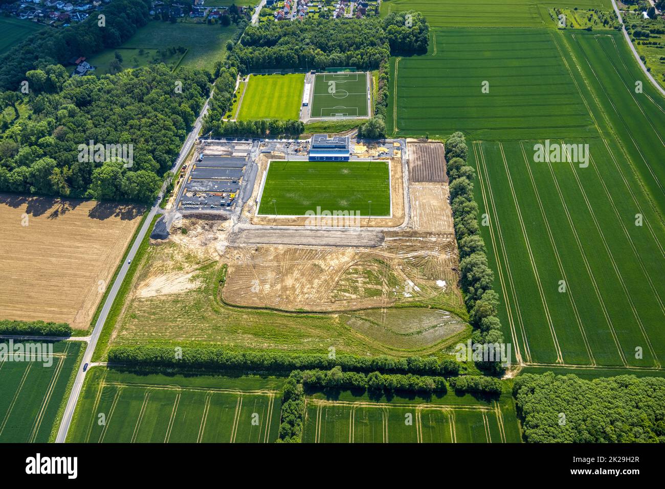 Aerial view, construction site and new building Westfalia Sportpark, sports field and club center Westfalia Rhynern with integrated sports day care ce Stock Photo