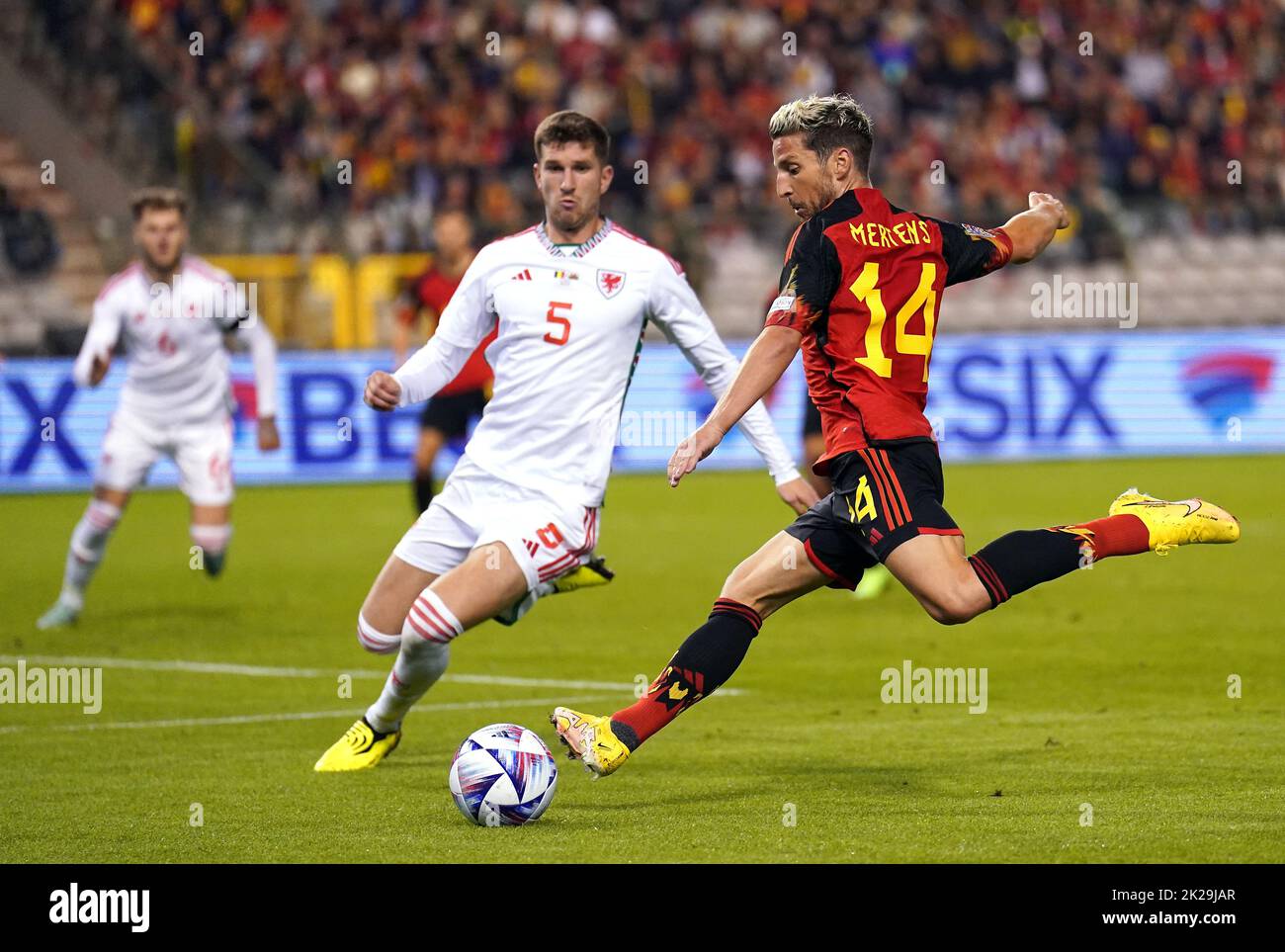 Belgium's Dries Mertens (right) and Wales' Chris Mepham battle for the ball during the UEFA Nations League Group D Match at King Baudouin Stadium, Brussels. Picture date: Thursday September 22, 2022. Stock Photo