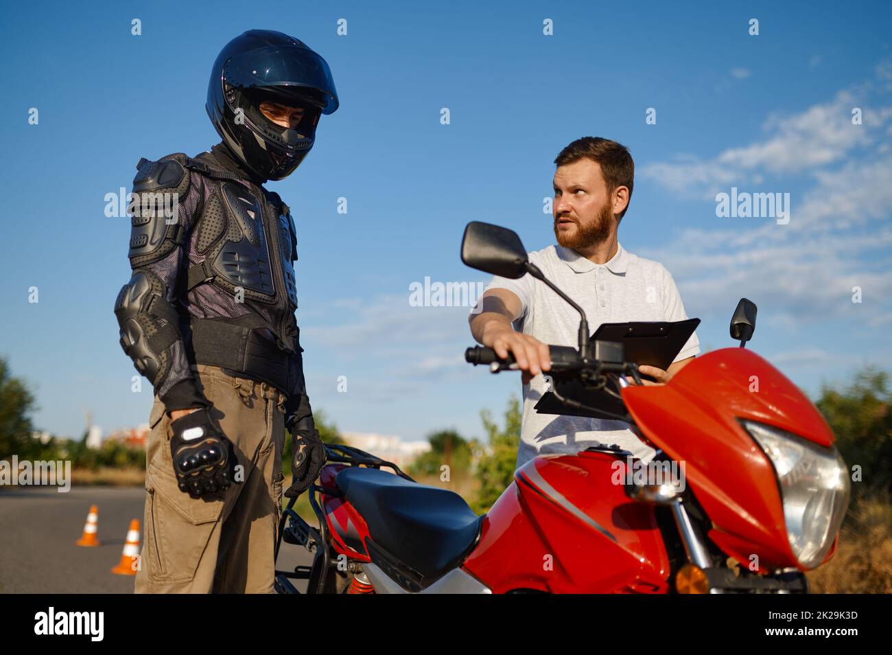 Driving lesson on motordrome, motorcycle school Stock Photo