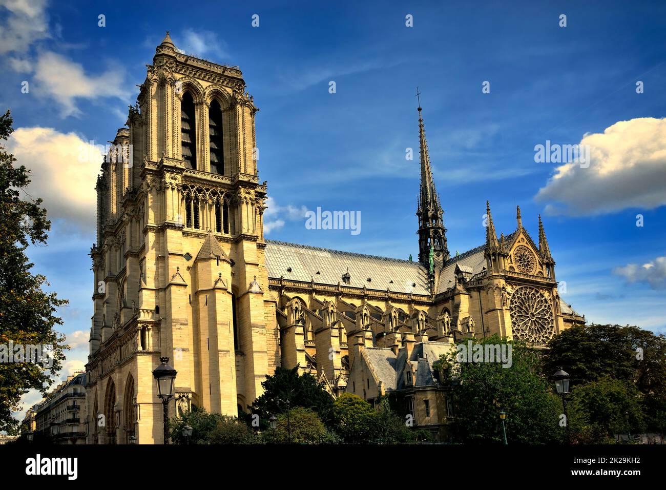 Cathedral of Notre-Dame in Paris feather clouds blue sky side view Stock Photo