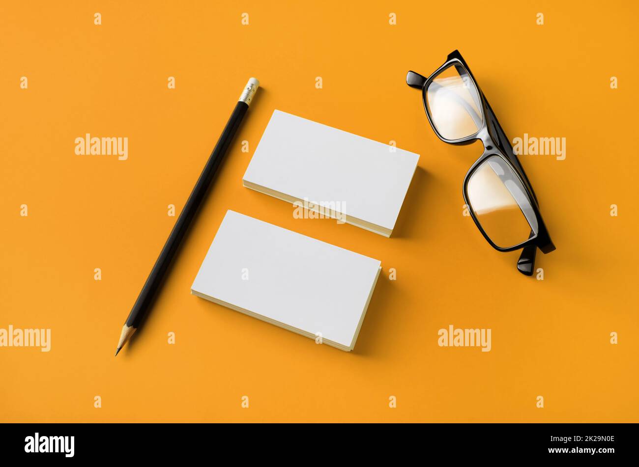 Business cards, glasses, pencil Stock Photo