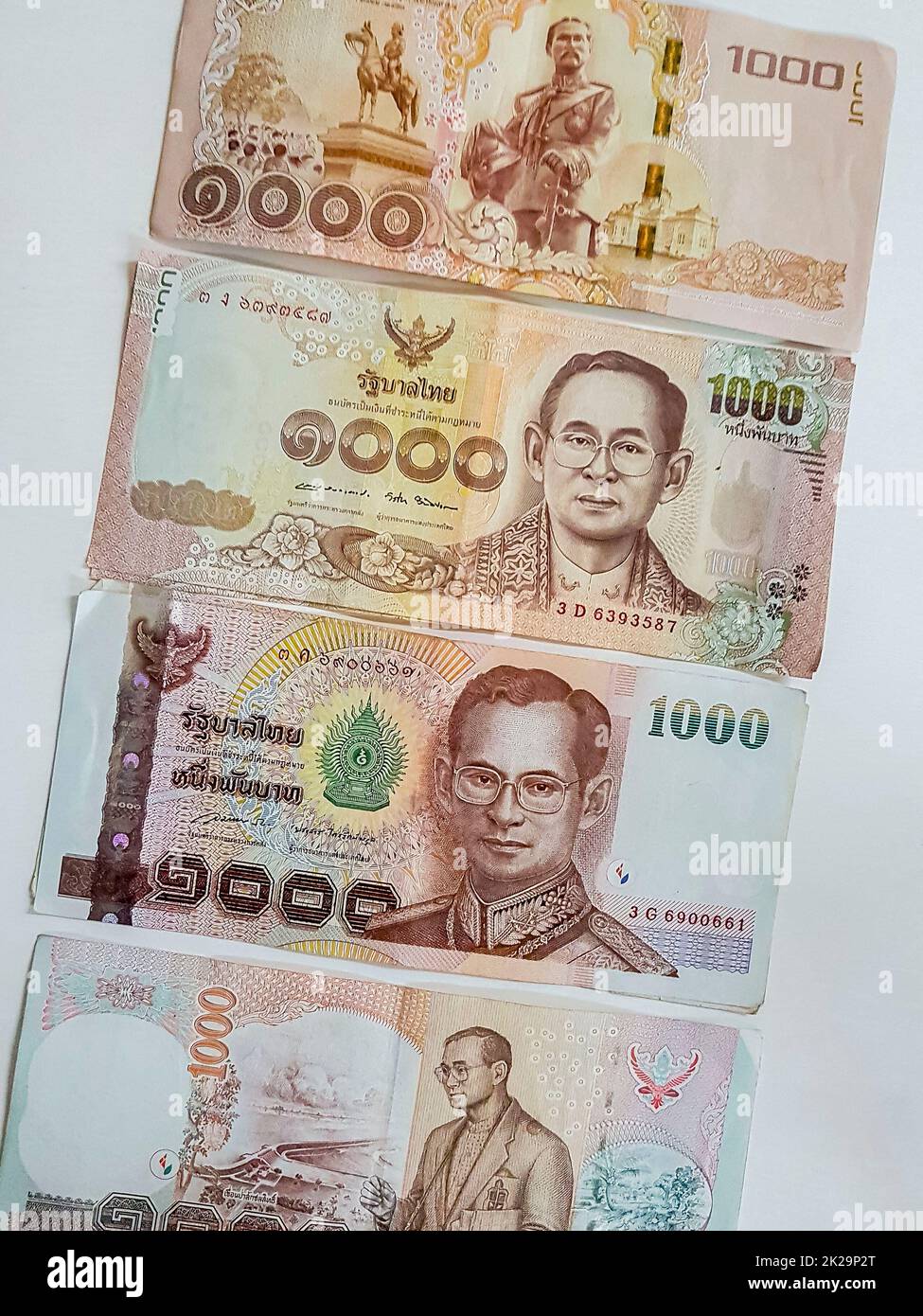 Thai money banknotes 4000 Thai Baht on white background. Stock Photo