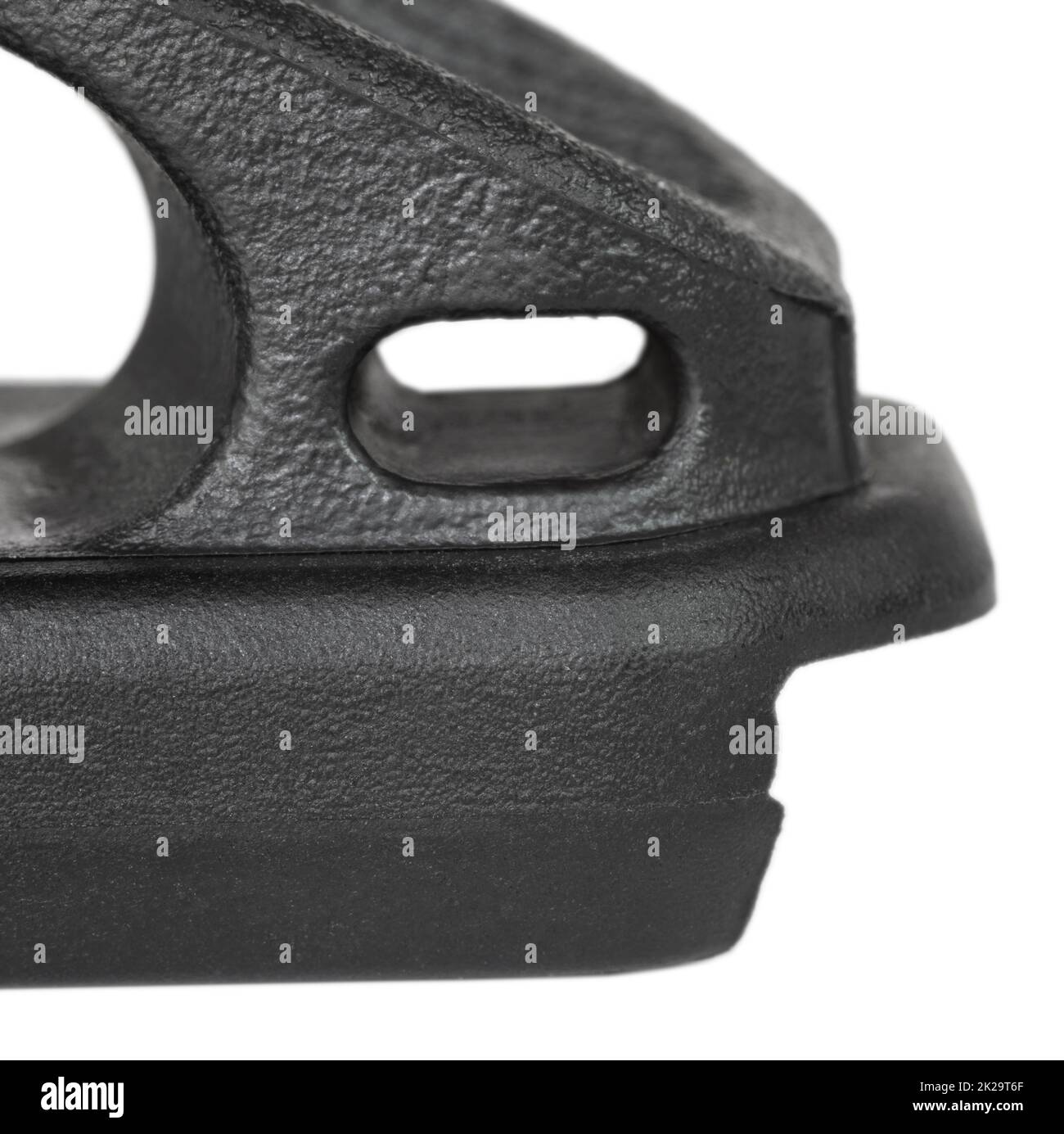 Lanyard hole in an assault rifle magazine extension isolated on white