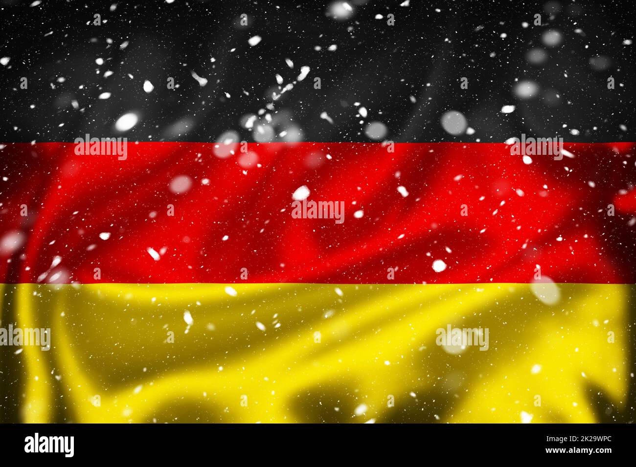 German silk surface flag and snow layer Stock Photo