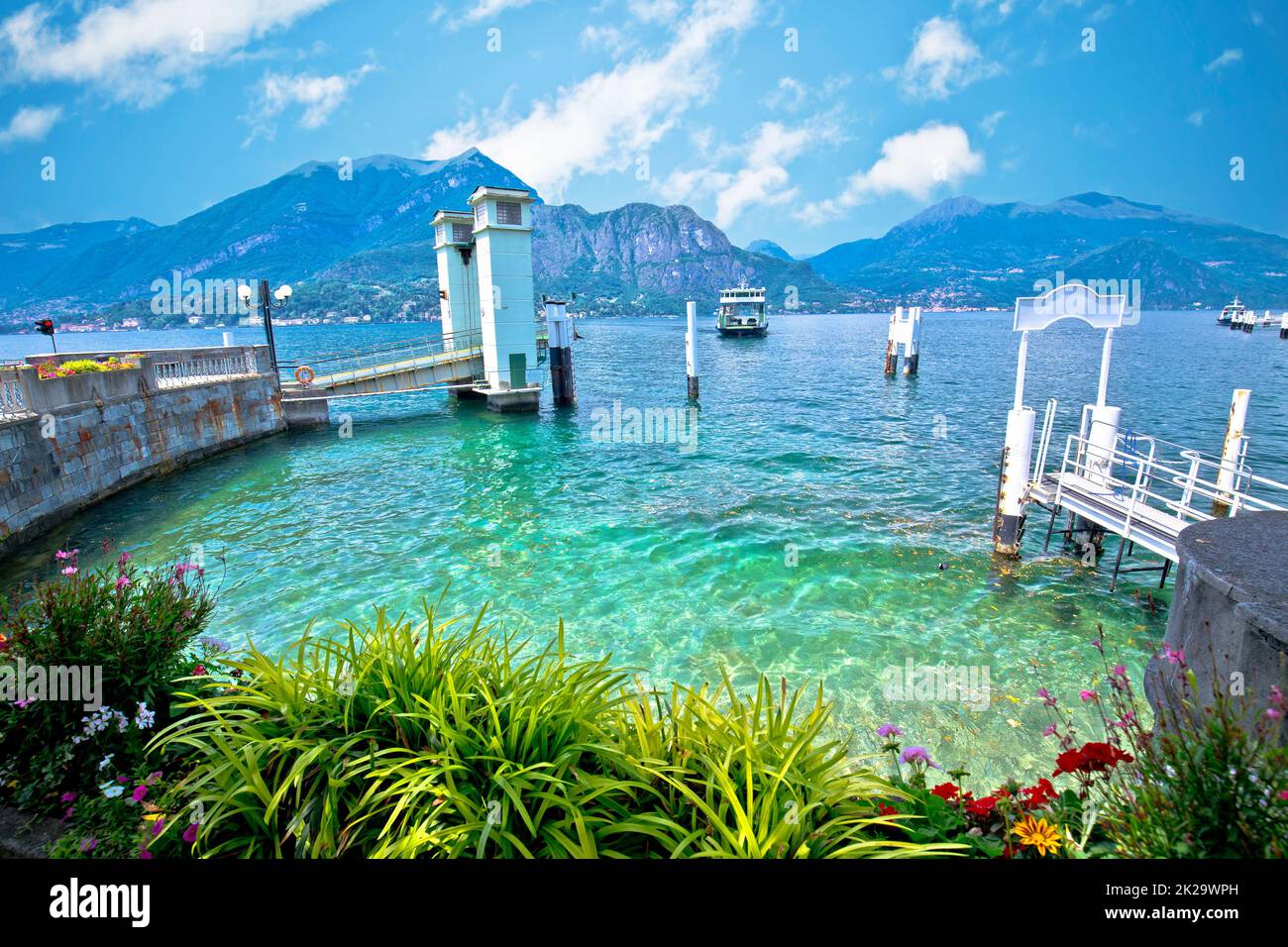 Ferry port in town of Belaggio on turquoise Como lake view Stock Photo