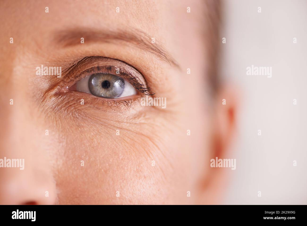 The fight against wrinkles. Closeup studio shot of a beautiful mature womans face. Stock Photo