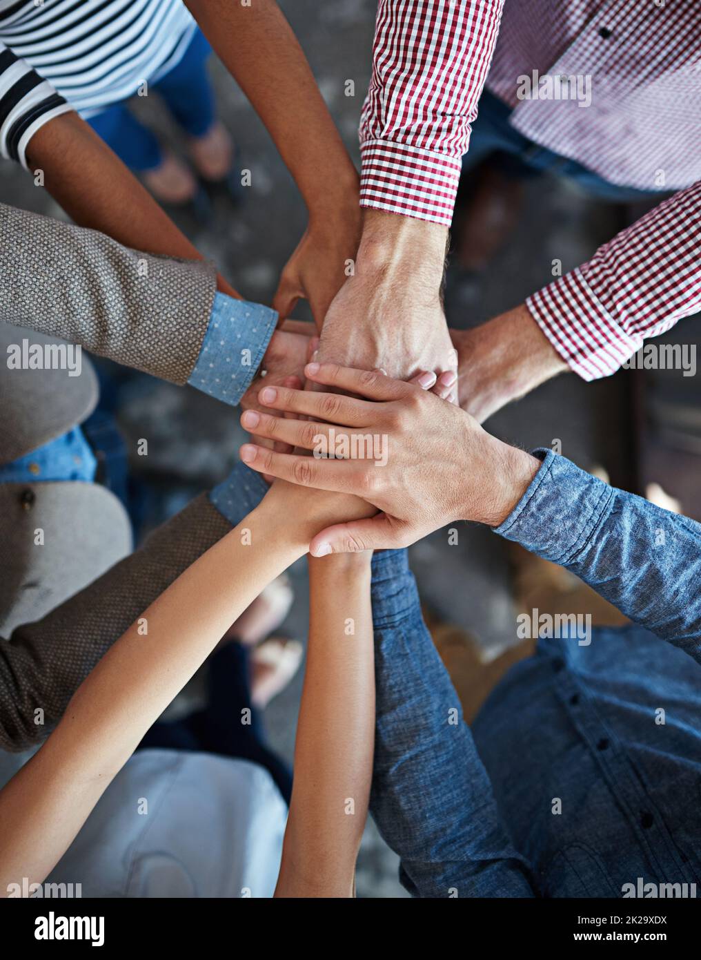 Lets do this team. Modern office space with candid creative business people interacting with each other. Stock Photo