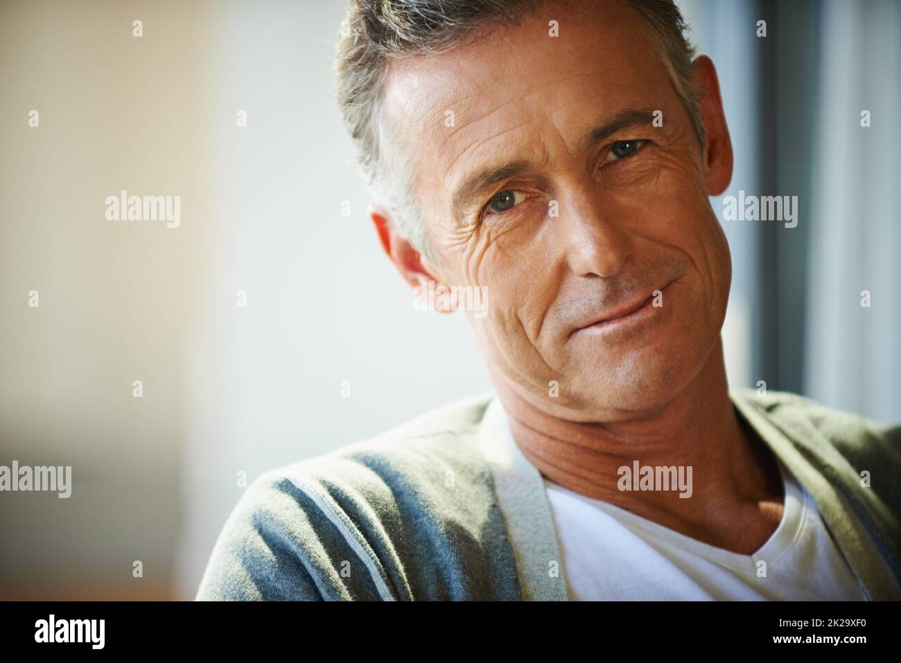 Rich in life experience. Cropped view of a handsome mature man looking at the camera. Stock Photo
