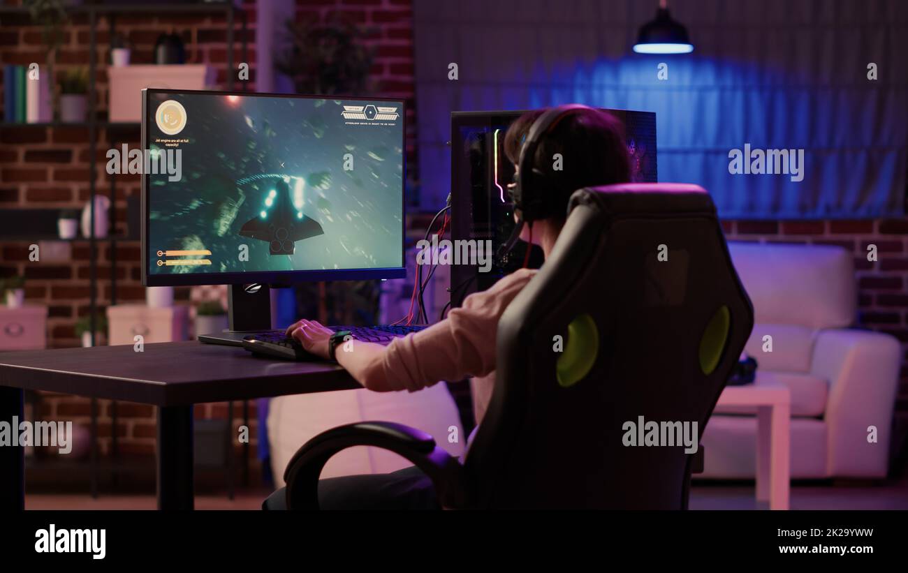 Premium Photo  Static tripod shot of gamer playing multiplayer first  person shooter on pc while gaming girl is fighting in virtual reality  simulation. man streaming online action game while woman uses