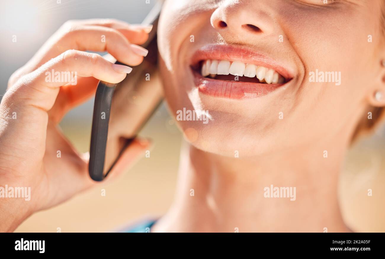 Phone, hands and mouth with a woman on call for communication and networking outside. Closeup of a mobile in the hand of a happy female talking with a Stock Photo