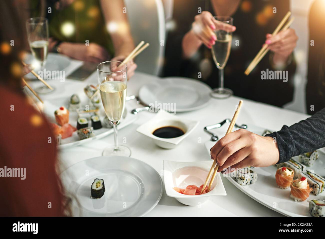 Good food, good friends, good times. Shot of friends having a dinner party at a restaurant. Stock Photo