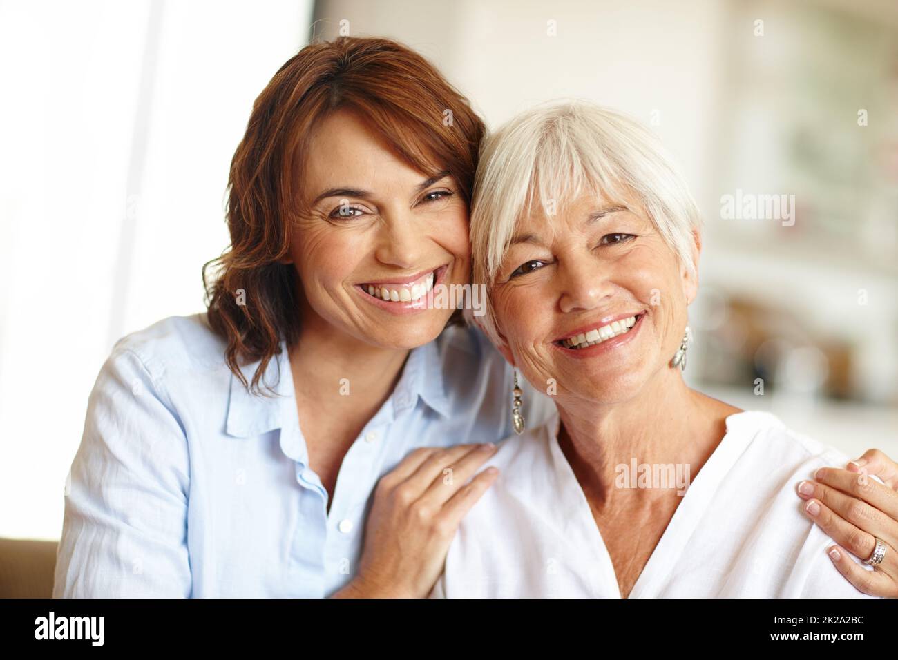 First my mother, forever my friend. Portrait of a woman spending time with her elderly mother. Stock Photo