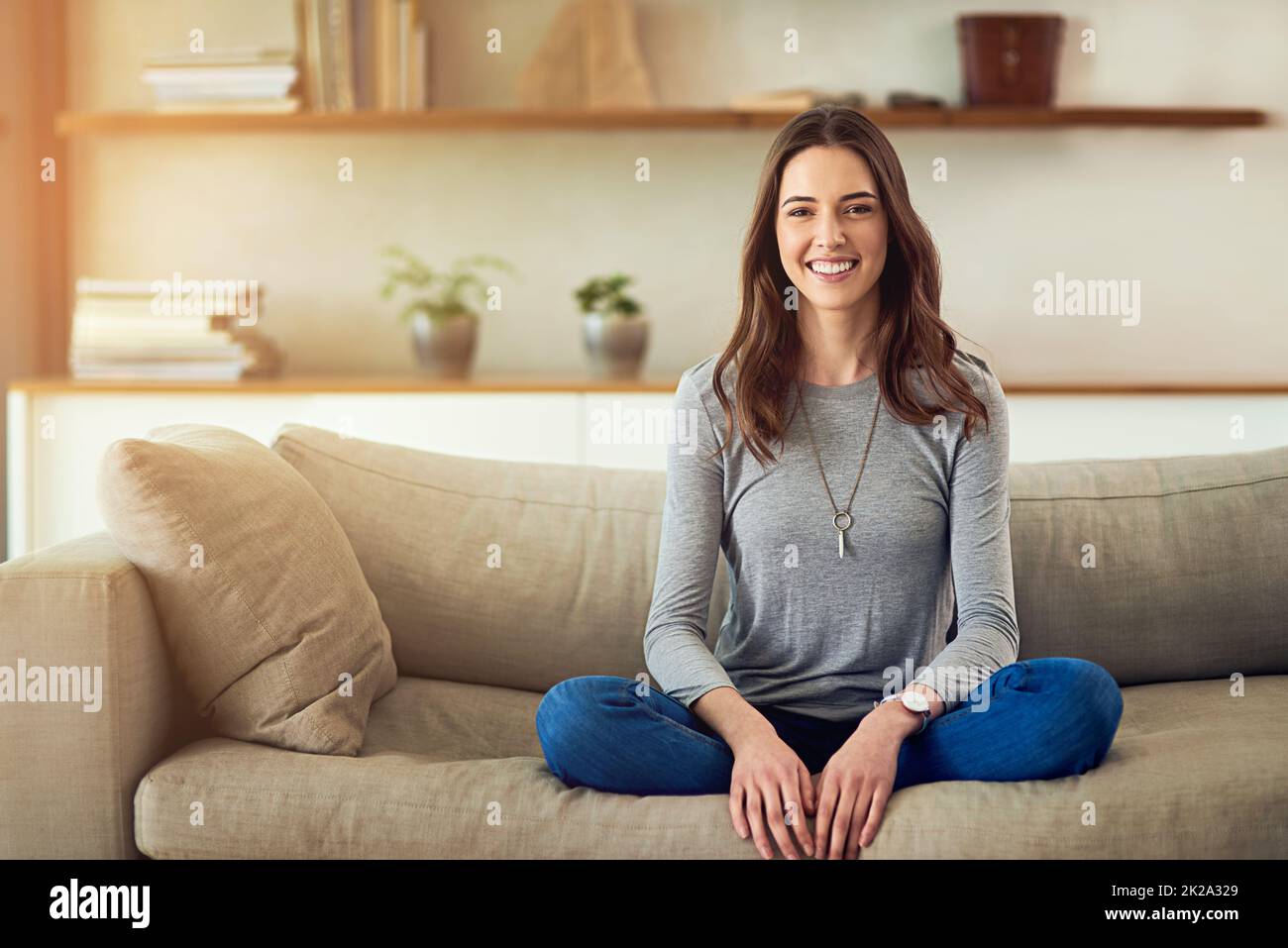 Woman relaxing sofa hi-res stock photography and images - Alamy