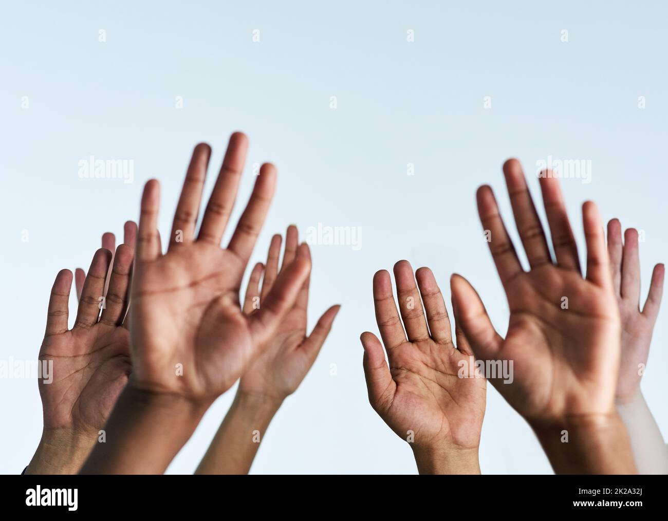 Raise your hands in support of each other shot of a group of hands