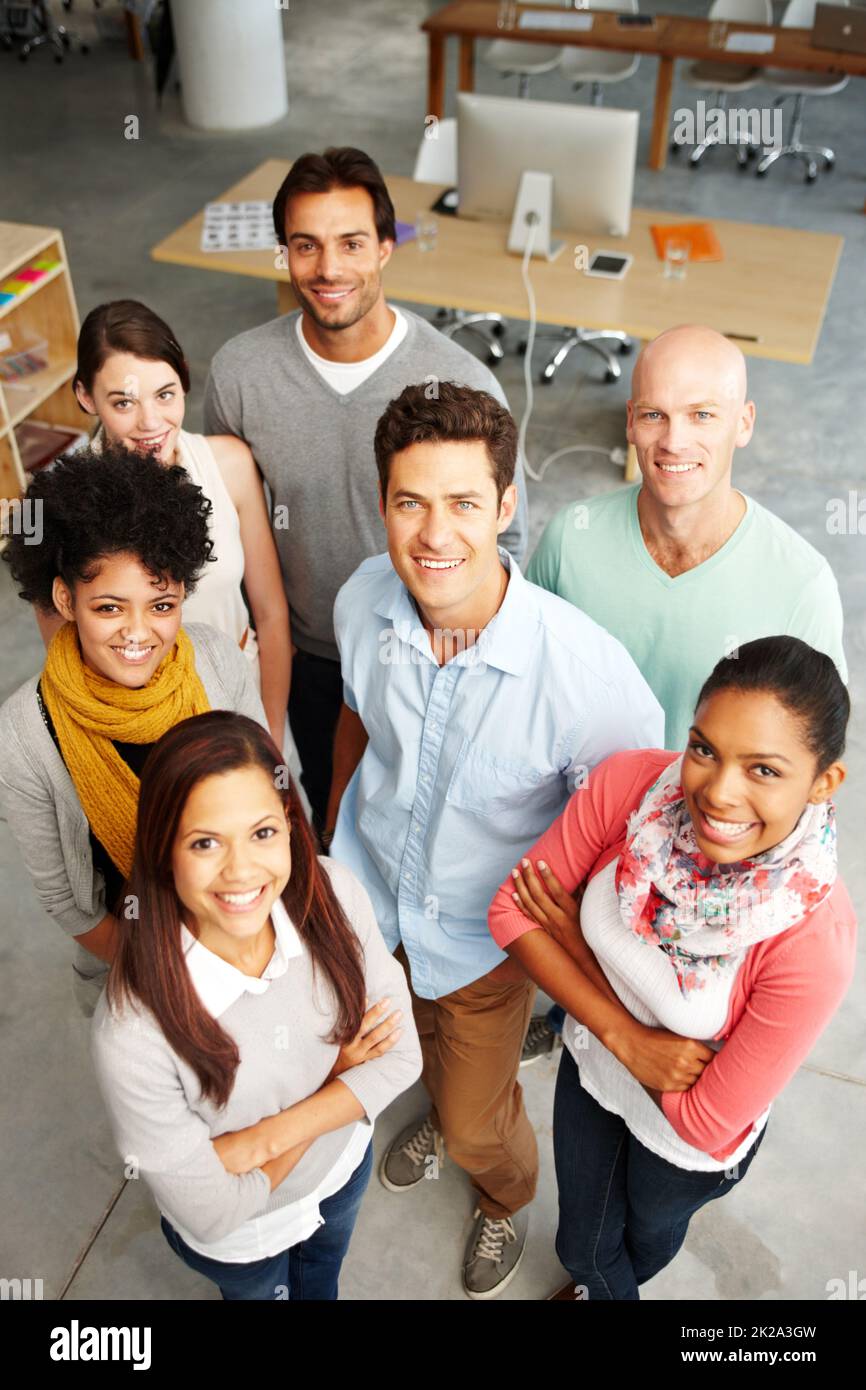 Leaders in their field. High angle view portrait of a group of multi-ethnic people in a work environment. Stock Photo