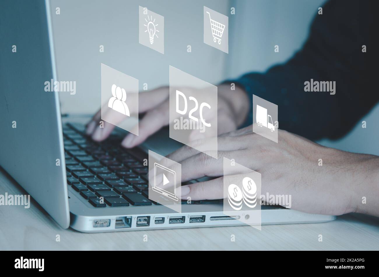 hand typing on computer laptop icon symbol Direct to Consumer D2C virtual screen Internet Business big data Technology Concept. Stock Photo