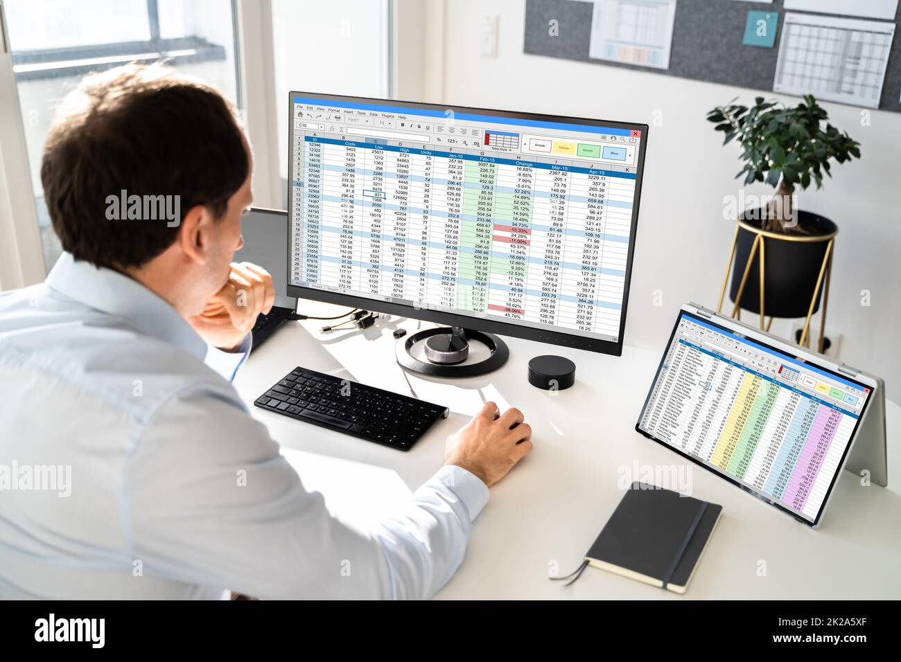 Analyst Working With Spreadsheet Business Data Stock Photo