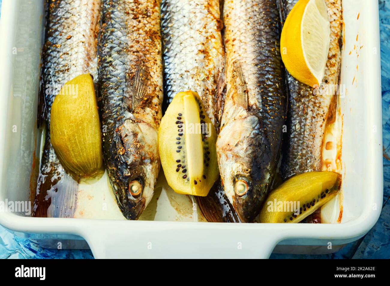 Baked fish pelengas, seafood Stock Photo - Alamy