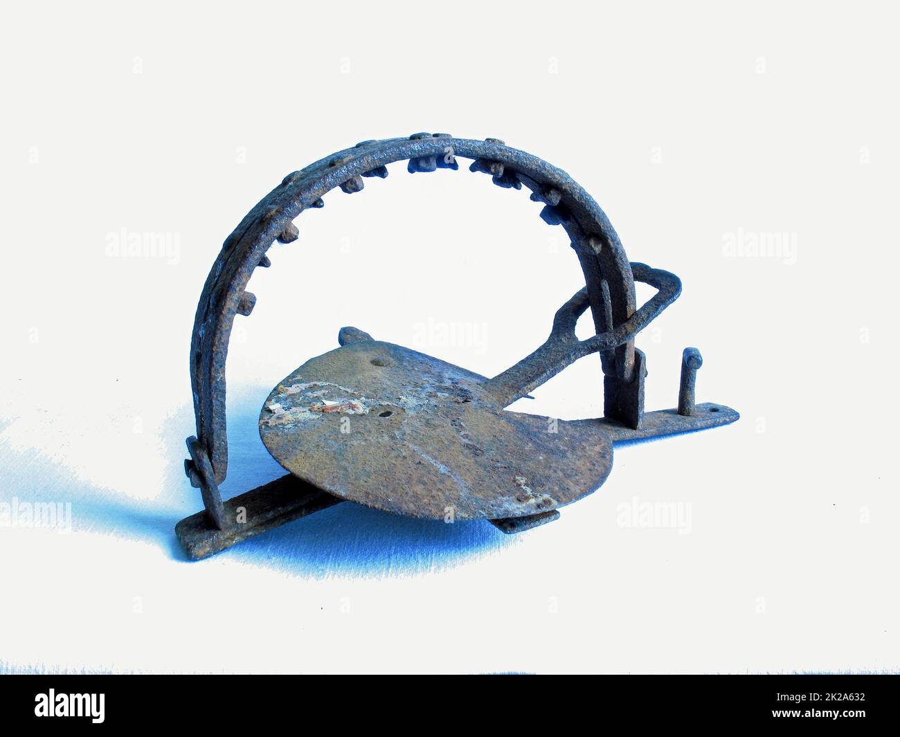 A Metal Animal Trap That Is Open Attached To The Ground With A Metal Chain  On An Isolated Background Stock Photo, Picture and Royalty Free Image.  Image 22348021.
