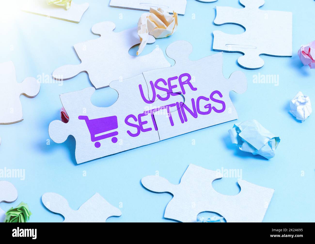 Conceptual caption User Settings. Business overview Configuration of appearance Operating System Personalized Building An Unfinished White Jigsaw Pattern Puzzle With Missing Last Piece Stock Photo
