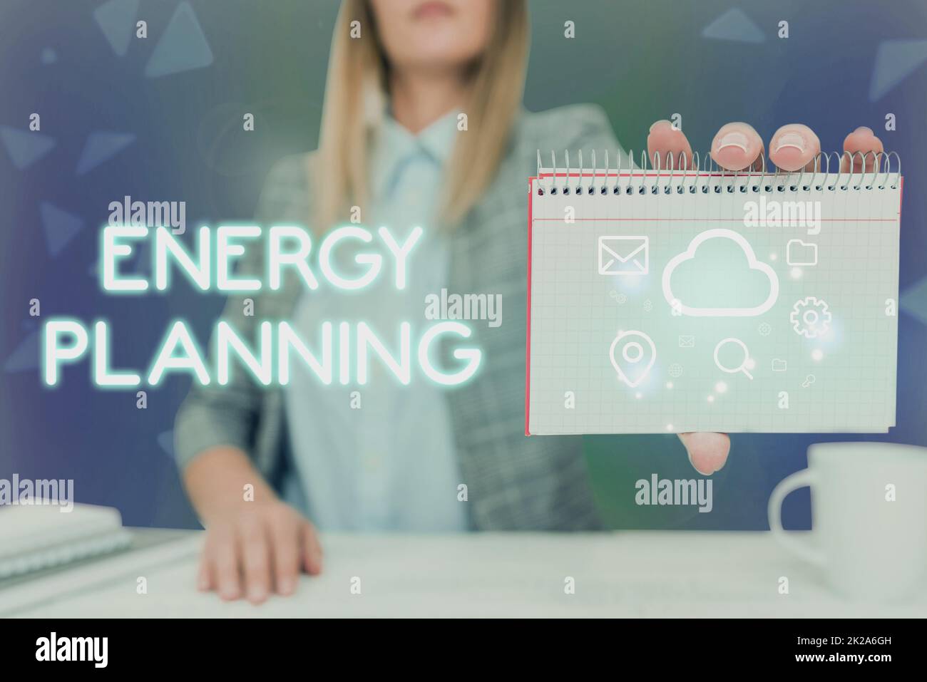Conceptual caption Energy Planning. Business concept making of a strategy and plan for the consumption of energy Lady Pressing Screen Of Mobile Phone Showing The Futuristic Technology Stock Photo